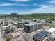Gorgeous aerial view of the new condo buildings and surrounding city with blue skies at 20 Wilcox St # 517, Castle Rock, CO 80104