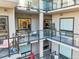 Relaxing balcony featuring glass railings, seating, and attractive architectural details at 20 Wilcox St # 517, Castle Rock, CO 80104
