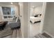 View from the living room into the cozy bedroom with soft carpet and a comfortable bed at 20 Wilcox St # 517, Castle Rock, CO 80104