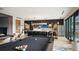Modern common area featuring a black pool table and a kitchen island, with sleek decor and modern lighting at 20 Wilcox St # 517, Castle Rock, CO 80104