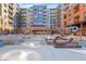 Attractive condo complex exterior featuring a well-maintained courtyard and architectural details at 20 Wilcox St # 517, Castle Rock, CO 80104