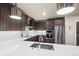 Stylish kitchen features stainless steel appliances, custom cabinets, and a large island with sleek countertops at 20 Wilcox St # 517, Castle Rock, CO 80104