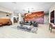 Well-lit lobby area with modern furniture, decorative lighting and artistic accents at 20 Wilcox St # 517, Castle Rock, CO 80104