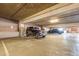 Reserved parking spots in an expansive parking garage offer secure and convenient vehicle storage at 20 Wilcox St # 517, Castle Rock, CO 80104