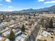 Panoramic aerial view of the neighborhood with stunning mountain backdrop, showcasing community and natural beauty at 4640 Macky Way, Boulder, CO 80305