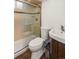 Bathroom featuring a shower-tub, tiled walls, and modern fixtures and vanity at 4640 Macky Way, Boulder, CO 80305