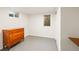 Finished bedroom with hardwood floors, a dresser, and a window providing natural light at 4640 Macky Way, Boulder, CO 80305