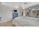 Light bedroom features a dedicated workspace, and carpeted floors at 5677 S Park Pl # B110, Greenwood Village, CO 80111