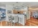 Eat-in kitchen features modern lighting, stainless appliances, and eat in table at 5677 S Park Pl # B110, Greenwood Village, CO 80111