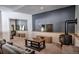 Entertainment room with a fireplace, TV, and comfortable seating at 492 Kimmes Ln, Breckenridge, CO 80424