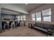 Recreation room with bar seating and a black leather sofa at 492 Kimmes Ln, Breckenridge, CO 80424