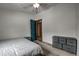 Simple bedroom with wood floor, comfortable double bed, and ample storage space at 492 Kimmes Ln, Breckenridge, CO 80424