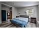 Comfortable bedroom featuring a large window, wood-look floors and neutral decor at 492 Kimmes Ln, Breckenridge, CO 80424