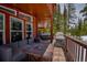 Outdoor deck with furniture, hot tub, and scenic mountain views, ideal for relaxation and entertaining at 492 Kimmes Ln, Breckenridge, CO 80424