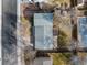 Aerial shot of the home with a well-maintained roof, driveway, and back deck at 6252 W 70Th Pl, Arvada, CO 80003