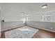 Finished basement with wood paneled walls, hardwood floors and a carpet at 6252 W 70Th Pl, Arvada, CO 80003