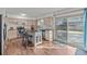 Bright kitchen featuring stainless steel appliances, an island with seating, and patio access at 6252 W 70Th Pl, Arvada, CO 80003