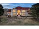 Gorgeous two-story home with brick and siding, featuring a well-manicured front yard at 19185 Breton Pl, Monument, CO 80132