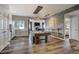 Spacious game room with a pool table, bar, and cozy seating area with a fireplace at 19185 Breton Pl, Monument, CO 80132