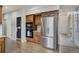 This kitchen features stainless appliances and warm wood cabinets, and also includes a large pantry at 19185 Breton Pl, Monument, CO 80132