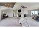 Expansive main bedroom with fireplace, TV, ceiling detail, and comfortable sitting area at 19185 Breton Pl, Monument, CO 80132