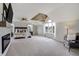 Bright and airy main bedroom featuring a modern ceiling, large window, and comfortable seating area at 19185 Breton Pl, Monument, CO 80132