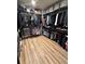 Walk-in closet features well-organized racks, shelves, and plenty of storage for clothes at 653 Glenarbor Cir, Longmont, CO 80504
