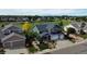 Beautiful home features a three-car garage and manicured front yard with mature landscaping at 653 Glenarbor Cir, Longmont, CO 80504