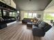 Inviting living room with large sectional sofa and entertainment center at 653 Glenarbor Cir, Longmont, CO 80504