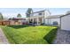 Expansive backyard with lush green lawn, offering great outdoor space at 4733 S Vivian Ct, Morrison, CO 80465