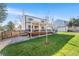Spacious backyard with a large deck, perfect for entertaining and relaxing at 4733 S Vivian Ct, Morrison, CO 80465