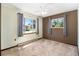 Bedroom features two-tone walls, carpet, and dual windows, providing ample sunlight and views at 7701 Hillgate Way, Parker, CO 80134
