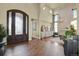 Bright entryway with arched doorway and tile floors at 10510 Ladera Dr, Lone Tree, CO 80124