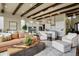 Modern kitchen with white cabinets and large island at 10510 Ladera Dr, Lone Tree, CO 80124