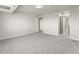 This bedroom has a large closet, neutral carpet, and an adjoining bathroom at 800 N Washington St # 1010, Denver, CO 80203