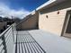 A modern outdoor balcony with metal railing provides a comfortable extension of the living space at 4469 Tennyson St # 4, Denver, CO 80212