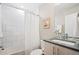 Bathroom featuring a shower-tub combo, light wood vanity, and modern fixtures at 4469 Tennyson St # 4, Denver, CO 80212