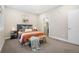 Comfortable bedroom featuring a bed, side tables, and modern decor at 4469 Tennyson St # 4, Denver, CO 80212