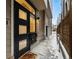 Inviting home featuring a modern front door and landscaped surroundings at 4469 Tennyson St # 4, Denver, CO 80212