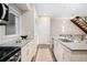 Beautiful kitchen with modern appliances, light cabinets, and hardwood floors at 4469 Tennyson St # 4, Denver, CO 80212