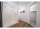Bathroom with shower, toilet and linen closet at 22052 E 38Th Pl, Aurora, CO 80019