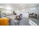 Versatile living area with seating, a workspace, and natural light at 22052 E 38Th Pl, Aurora, CO 80019