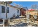 Brick patio with heater and grill, ideal for outdoor entertaining at 9676 Rensselaer Dr, Arvada, CO 80004