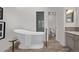 Spa-like bathroom with a soaking tub and a separate shower at 1661 Red Fox Pl, Highlands Ranch, CO 80126