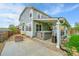 Backyard featuring a patio with a hot tub and fire pit perfect for entertaining at 3590 S Malaya St, Aurora, CO 80013