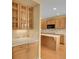 Kitchen with a large island and oak cabinets, offering ample storage and counter space at 3590 S Malaya St, Aurora, CO 80013