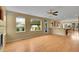 Open-concept living area with natural light and access to the backyard at 3590 S Malaya St, Aurora, CO 80013