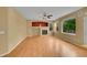 Living room with fireplace and neutral walls, offering ample natural light at 3590 S Malaya St, Aurora, CO 80013