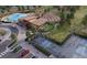Aerial view of pool, clubhouse, pickleball courts and seating area at the Trailstone community at 17152 W 91St Ln, Arvada, CO 80007