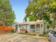 Exterior view of property featuring parking spots, porches, landscaping, and architectural details at 8236 Washington St # 29, Denver, CO 80229